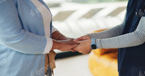 Preview: Nurse, senior woman and holding hands for support, wellness and comfort for kindness in home