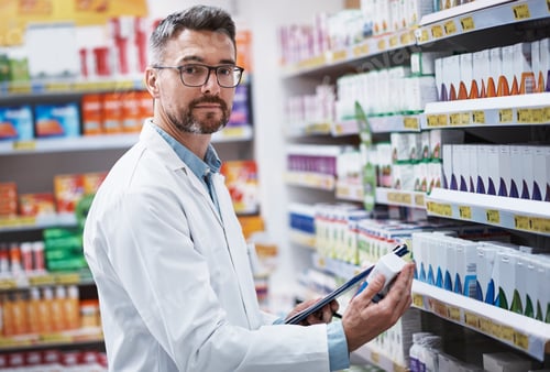 Preview: Pharmacist, portrait and man with clipboard, pills and prescription for inventory or drugs info
