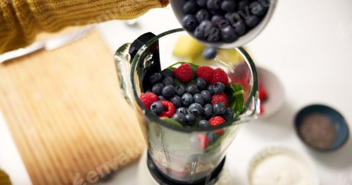 Preview: Kitchen, fruit and above of blender for smoothie in home for healthy drink, diet and detox