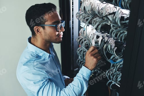 Preview: Man, IT technician and checking cables in mainframe for troubleshooting, storage or connection