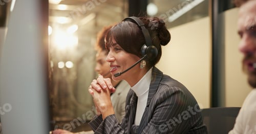 Preview: Happy, woman and coworkers with headset in call center, night and communication for lead generation