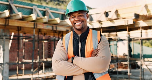 Preview: Crossed arms, building and portrait of black man on construction site for infrastructure career