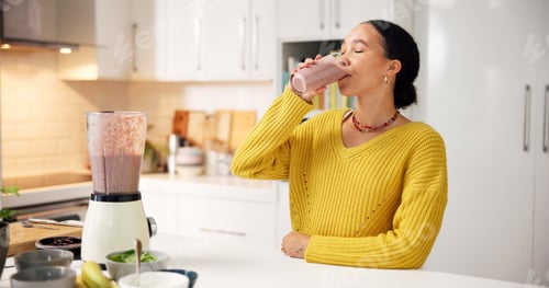 Preview: Blender, woman and drinking smoothie in kitchen for breakfast shake, healthy gut and nutrition
