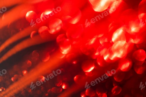 Preview: Abstract red bokeh background with soft focus, featuring circular light patterns and gradients, crea