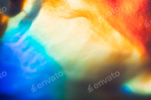 Preview: Abstract colorful light patterns with vibrant hues of blue, orange, and yellow blending seamlessly,