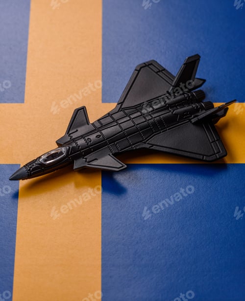 Preview: A fighter jet against the Swedish flag as a conceptual background representing defense