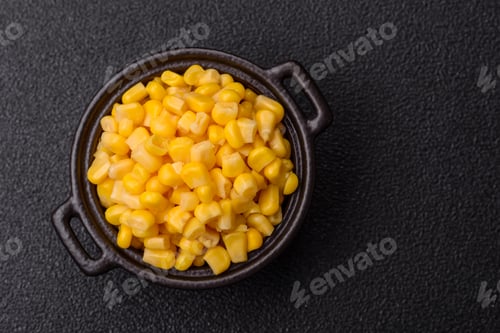 Preview: Golden, sweet canned corn kernels or maize for salads and vegetarian dishes. Canned corn