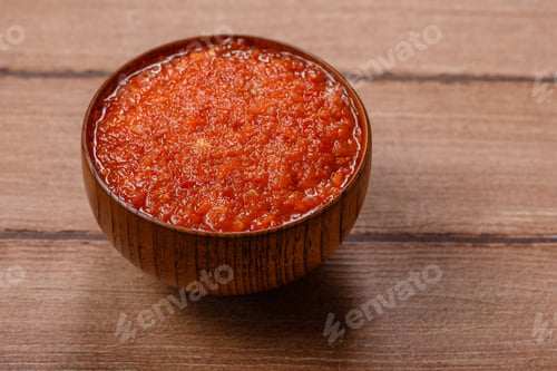 Preview: Red tomato Bolognese sauce with spices, salt, pepper, and herbs. A red sauce