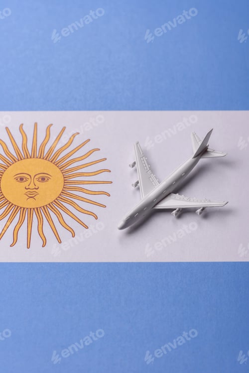 Preview: Airplane on the Argentine flag as a conceptual backdrop for flights. Airplane on the Argentine flag