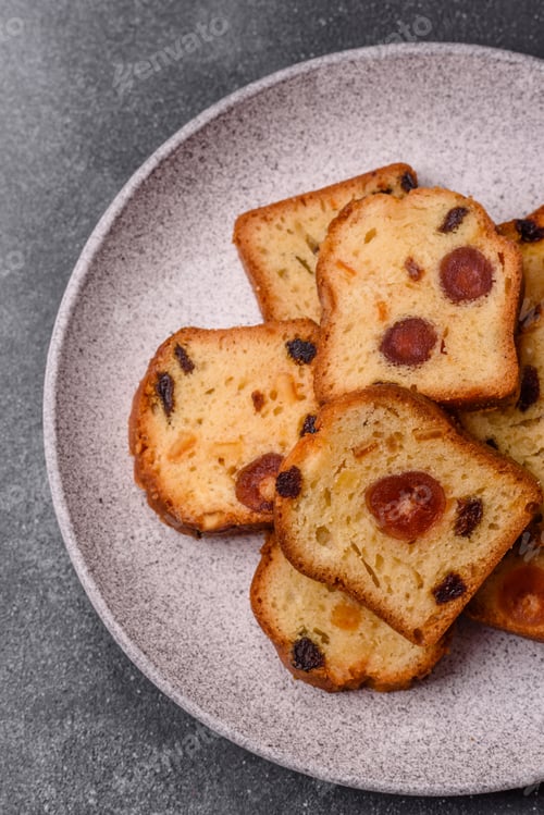 Preview: Fruit cake, a dessert with cherries, plums, and raisins for a festive Christmas table. Fruit cake