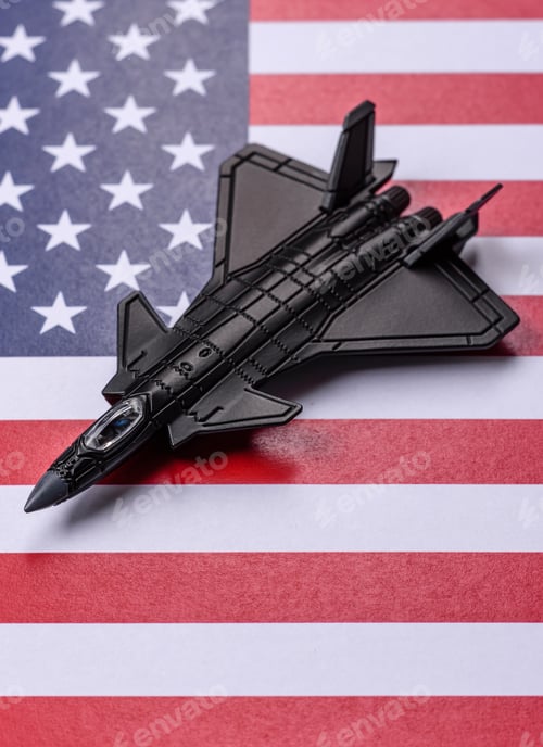 Preview: A fighter jet against the US flag as a conceptual background representing defense