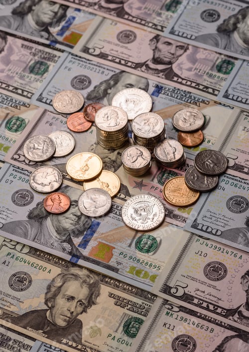 Preview: Paper US dollar bills of various denominations and cent coins as a business tool. Cash US dollars