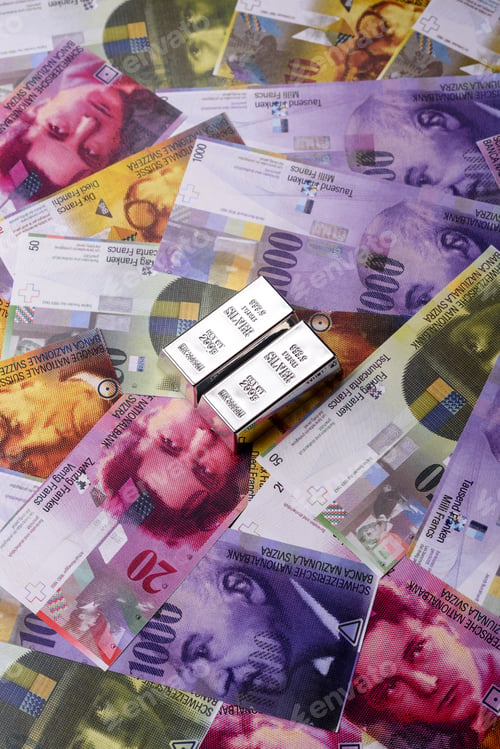 Preview: A silver bar, white metal against a backdrop of Swiss flag, as a concept for the sales. A silver bar