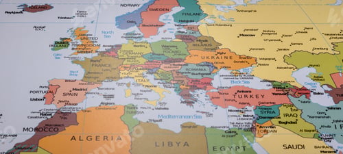 Preview: A global world map as a backdrop for themes of trips, travel, hiking, or relocation. A world map