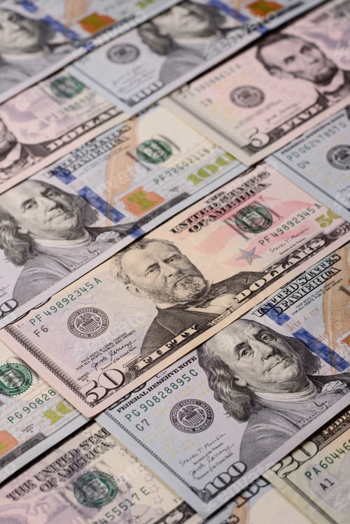 Preview: Paper US dollar bills of various denominations and cent coins as a business tool. Cash US dollars