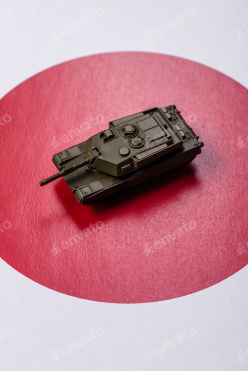 Preview: A tank on the Japanese flag as a conceptual backdrop representing defense