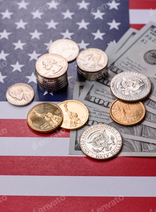 Preview: Paper US dollar bills of various denominations and cent coins as a business tool. Cash US dollars