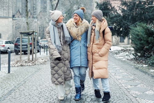 Preview: Three cheerful young adult women friend walk Magdeburg street old european uk german town city stree