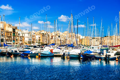 Preview: Valetta marina boats blue water sunny day Malta