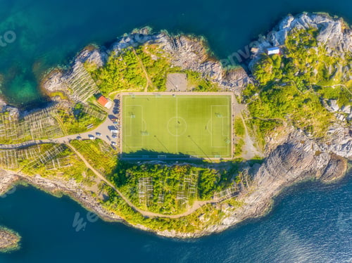 Preview: Aerial top down view of the famous Henningsvaer football stadium in Lofoten islands, Norway.
