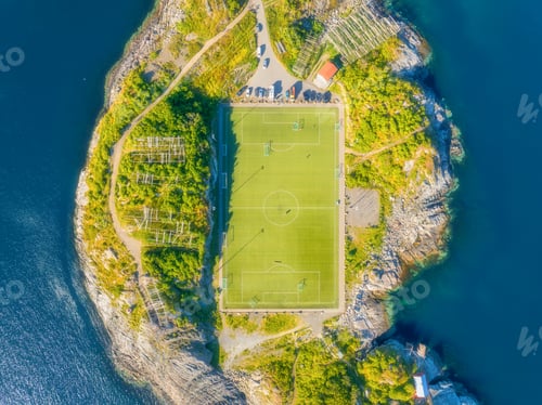 Preview: Aerial top down view of the famous Henningsvaer football stadium in Lofoten islands, Norway.