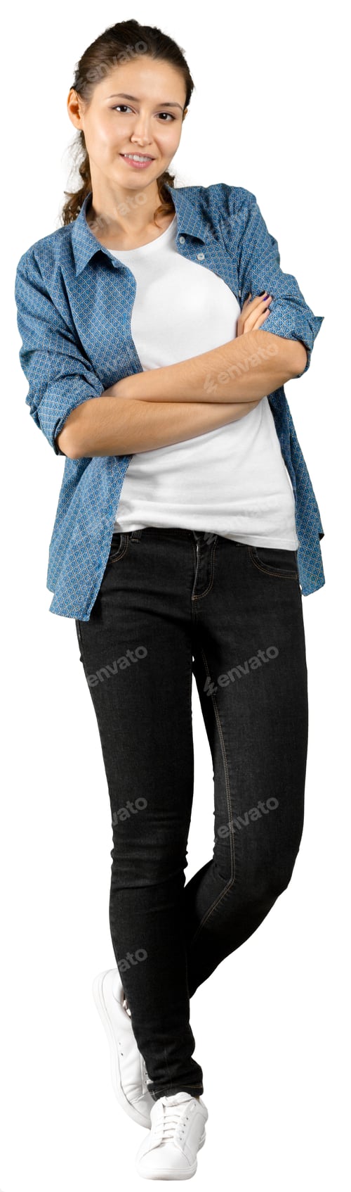 Preview: Young woman poses with arms crossed in casual outfit in indoor setting with white background