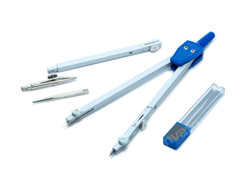Preview: Tools for drawing and measuring in a school setting on a white surface