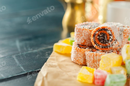 Preview: Dessert sweets arranged on a table with colorful candy and traditional treats