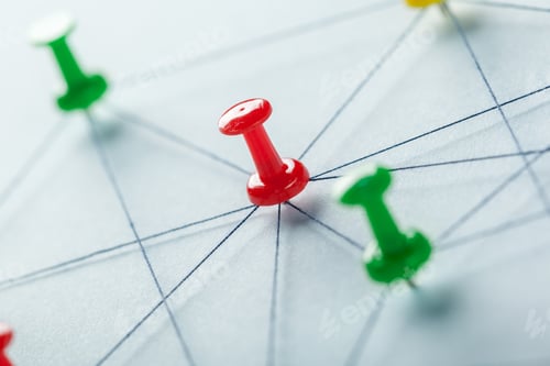 Preview: Red push pin on paper with connected lines showing a network design