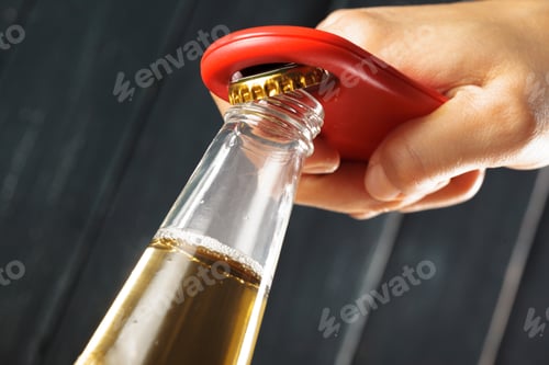 Preview: Glass bottle of beer and opener