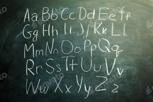 Preview: Letters written on a blackboard in a classroom during a learning session for children