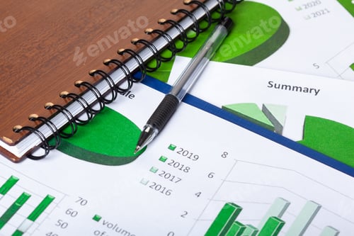 Preview: Data analysis and reporting with graphs and charts on a table with a pen