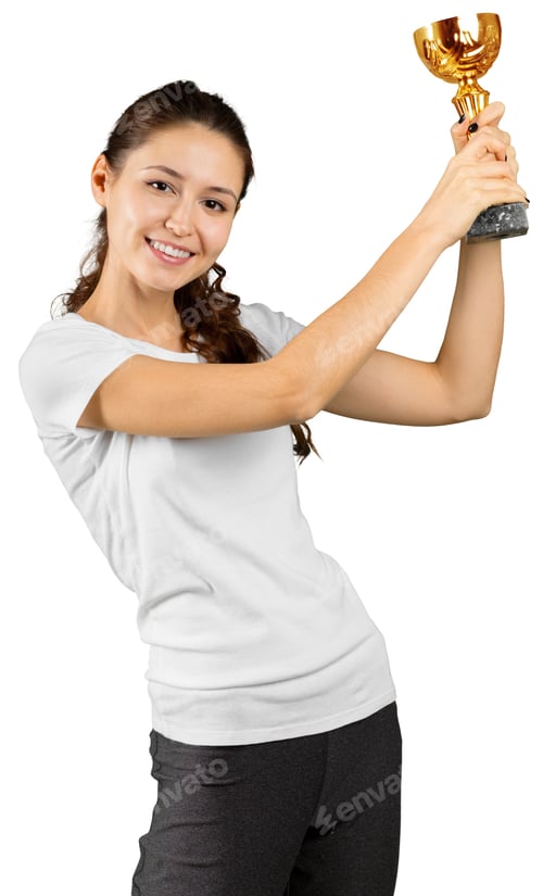Preview: Person holds trophy while smiling after winning a competition