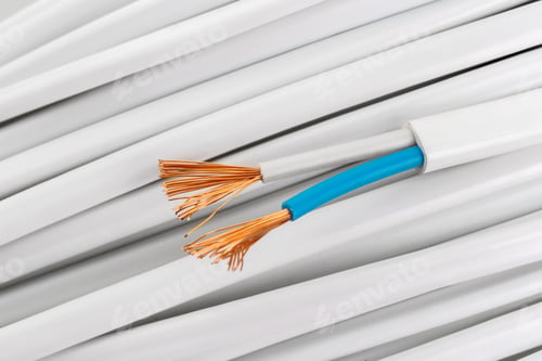 Preview: Wires show copper strands and blue insulation in close view on a white background