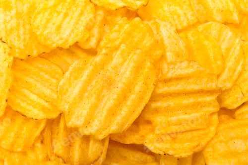 Preview: Crispy potato chips in a pile ready to be enjoyed at a snack time gathering