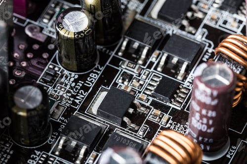 Preview: Close view of electronic circuit board with capacitors and chips in a technology workshop