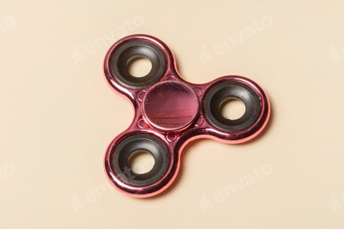 Preview: Fidget spinner sits on a light surface during a quiet afternoon moment