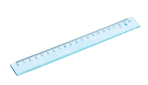 Preview: Clear plastic ruler with measurement markings placed on a white background