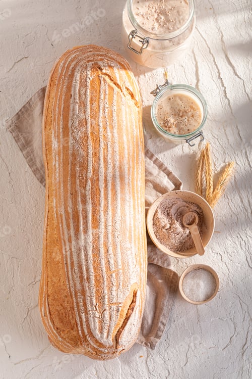 Preview: Fresh loaf of bread made with water and sourdough.