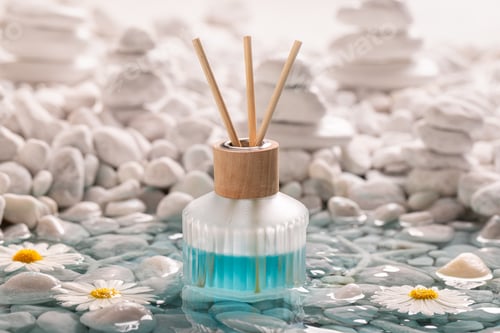 Preview: Aromatic diffuser fragrance on the coast of white stones.