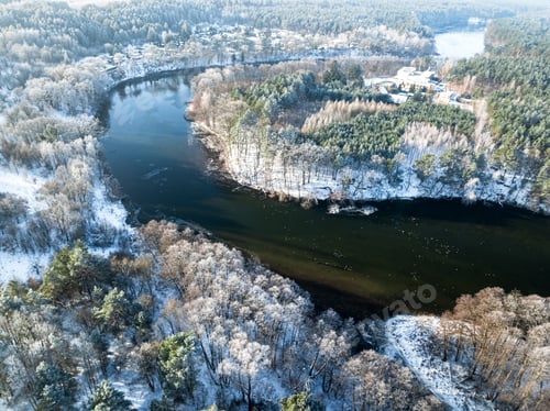 Preview: Frozen forest and river in early winter, Poland.
