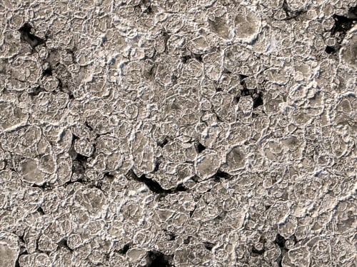 Preview: Top down view of frozen floes in winter on river.
