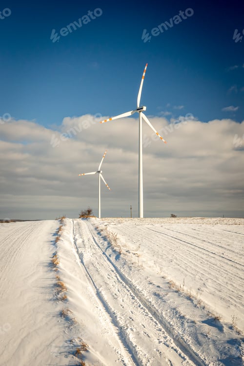 Preview: Wind turbine in snowy winter. Alternative energy in winter.