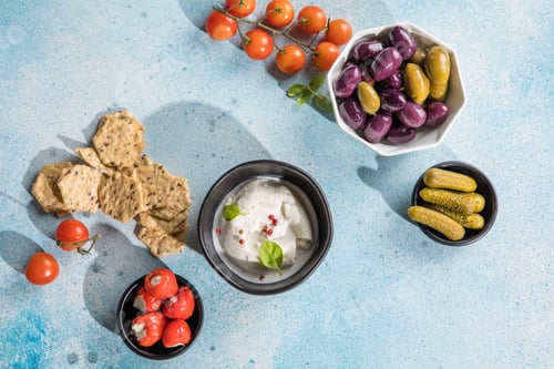 Preview: Burrata cheese ball, Mediterranean appetizer antipasti tapas bowls with green and calamata olives fe