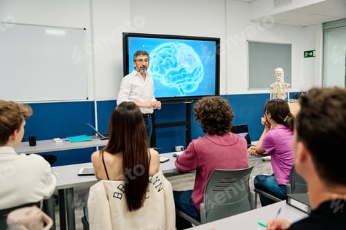 Preview: Professor teaching neuroscience to students in university classroom