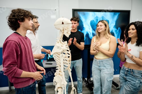 Preview: Students learning anatomy clapping in a modern classroom