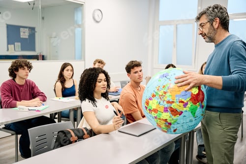 Preview: Geography teacher explaining world globe to university students