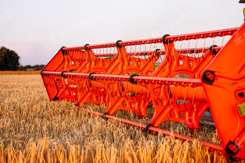 Preview: Close-up of combine harvester cutting summer barley crop