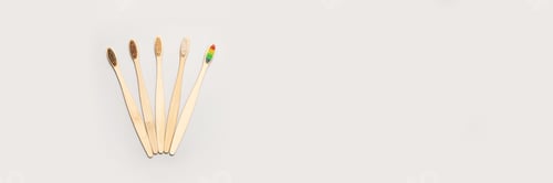 Preview: Set of ecology toothbrush on grey background. Different color.