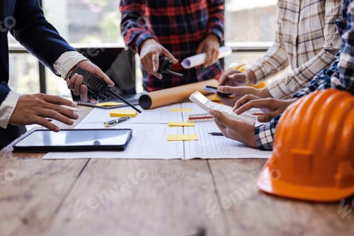 Preview: Architects and engineers are having a meeting in their office. They are working on a construction pr